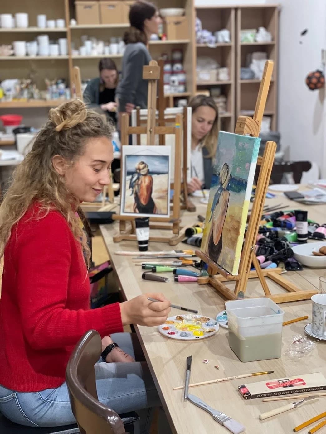 Woman painting at art studio