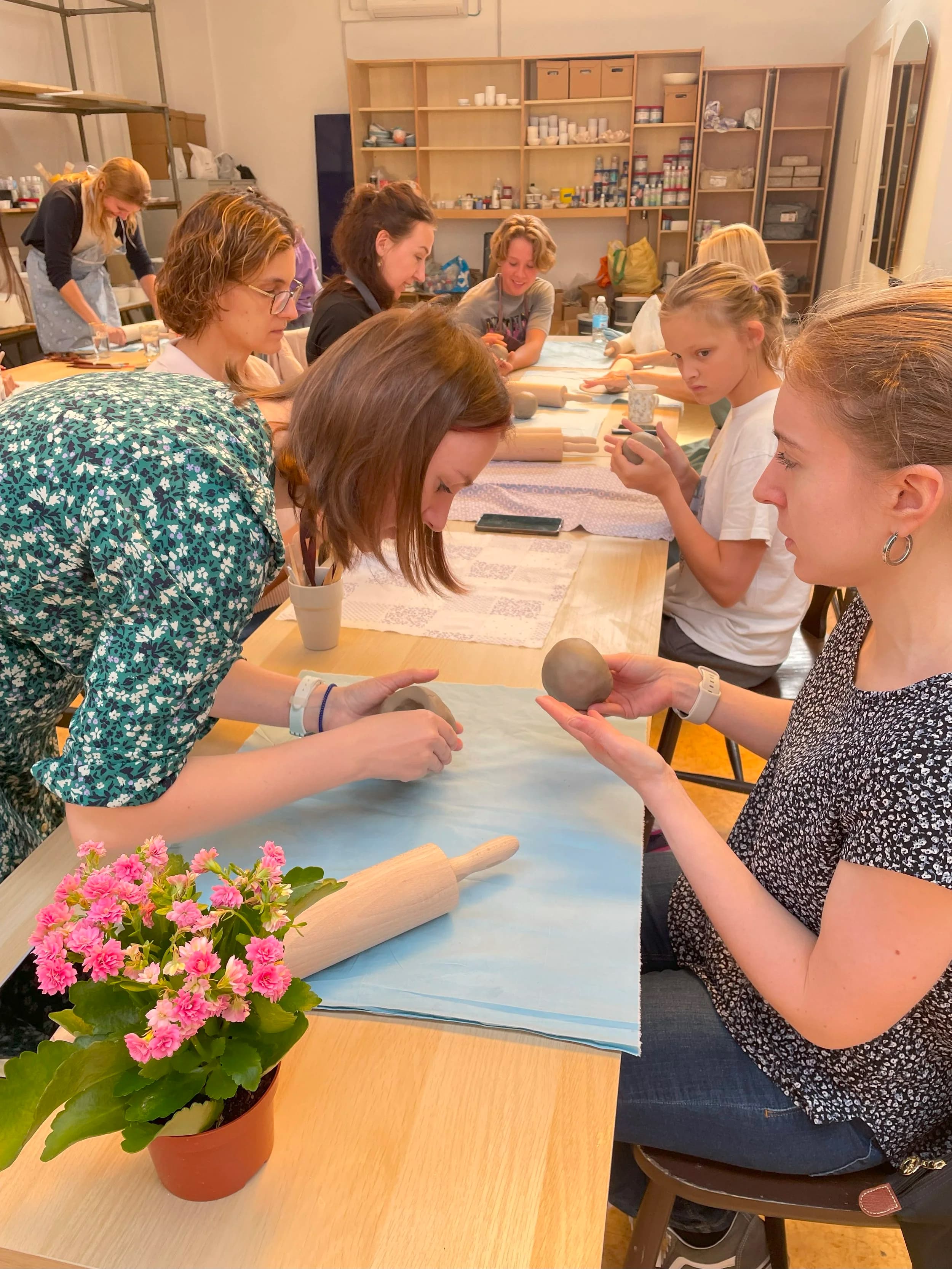 Bachelorette party making pottery together in Brussels